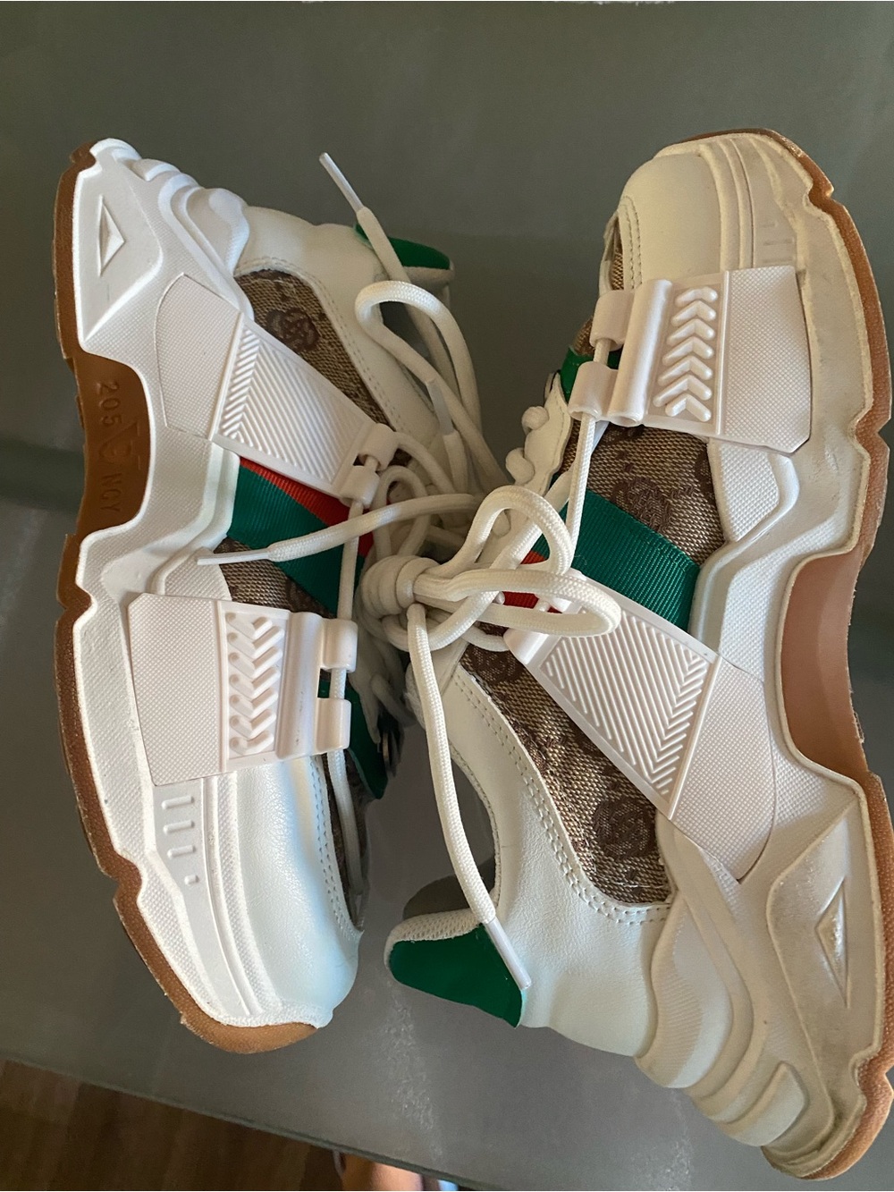 Amazon White Athletic Sneakers with Green and Brown Accents
